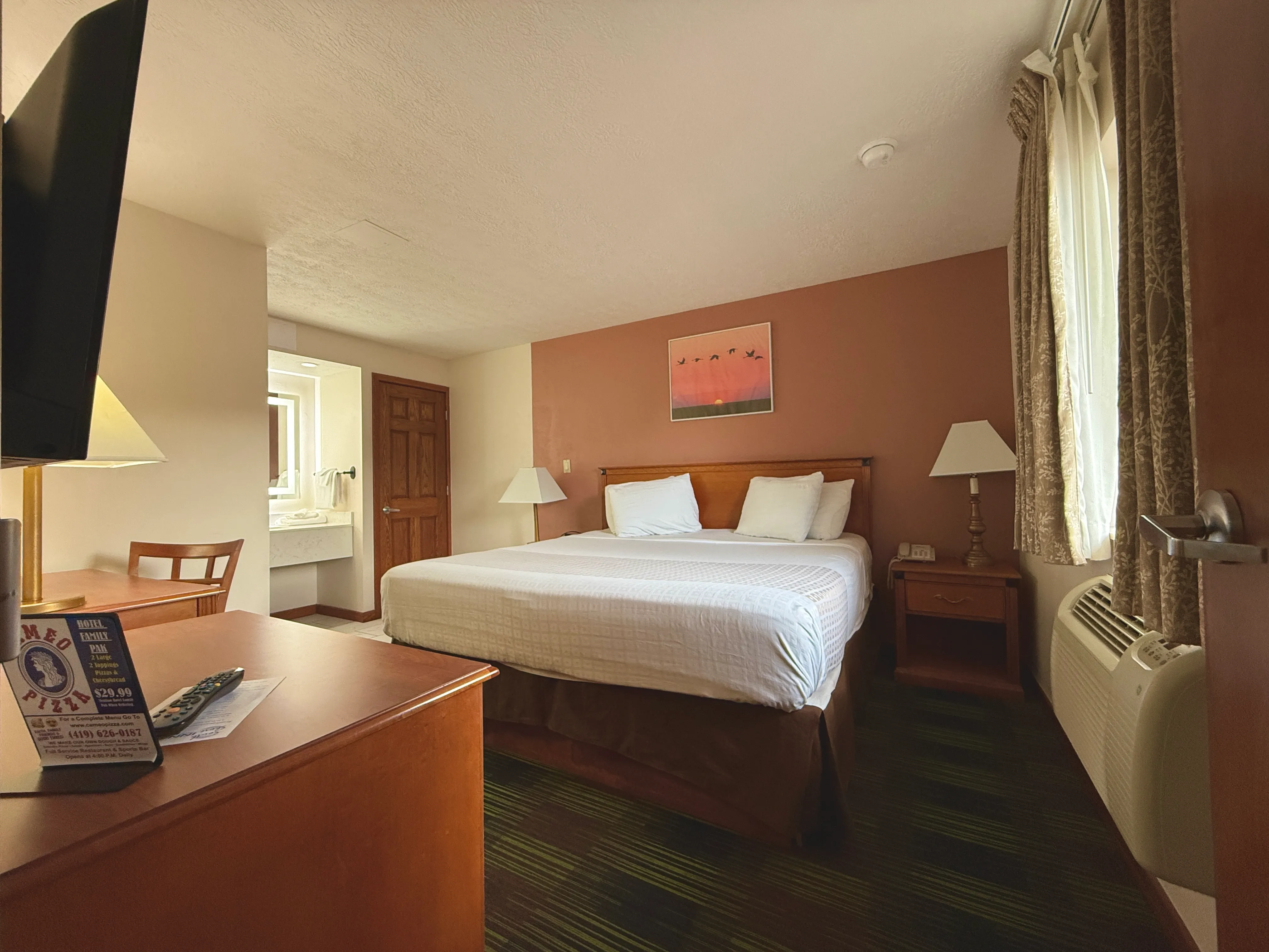 Three Room Suite with Bunks - King Bedroom at South Shore Inn Sandusky
