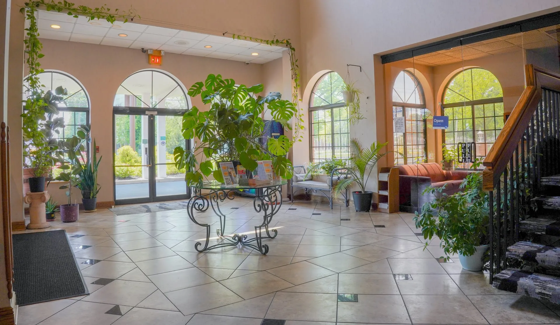 Welcoming lobby entrance with plants